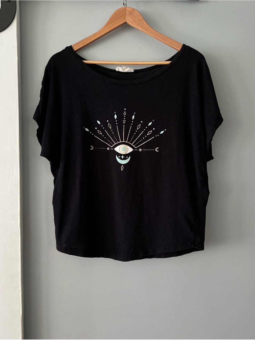 Synergy Organic Cotton Evil Eye Crescent Moon Graphic Short Sleeve Boat Neck Tee